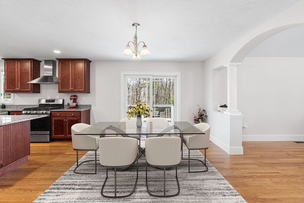 Chandelier, Dining room, Interior, Kitchen, Recessed Lighting, Stainless Steel Appliances, Wood Texture Flooring