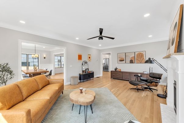 Dining room, Fireplace, Interior, Living room, Pendant Lights, Recessed Lighting, Wood Texture Flooring