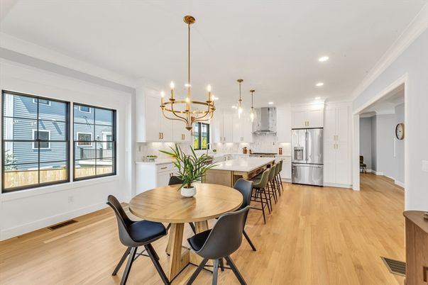 Chandelier, Dining room, Interior, Kitchen, Pendant Lights, Recessed Lighting, Stainless Steel Appliances, Wood Texture Flooring