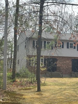 Exterior, Facade, Brick Facade, Raised Ranch