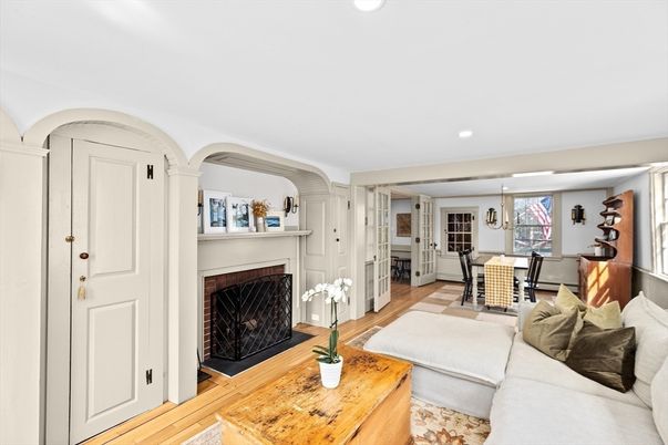 Dining room, Fireplace, Interior, Living room, Pendant Lights, Recessed Lighting, Wood Texture Flooring