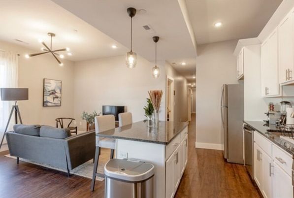 Dining room, Interior, Kitchen, Living room, Pendant Lights, Recessed Lighting, Stainless Steel Appliances, Wood Texture Flooring