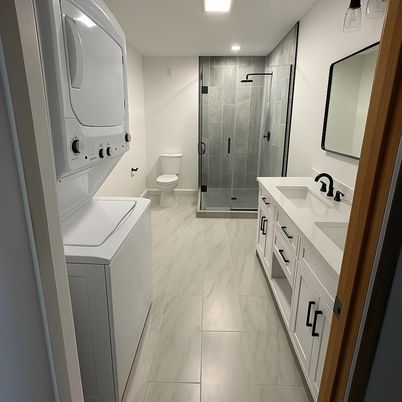 Bathroom, Dual Sink Vanities, Glass Shower, Interior, Marble, Recessed Lighting, Washer