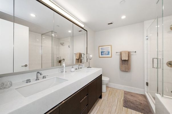 Bathroom, Dual Sink Vanities, Glass Shower, Interior, Recessed Lighting, Wood Texture Flooring