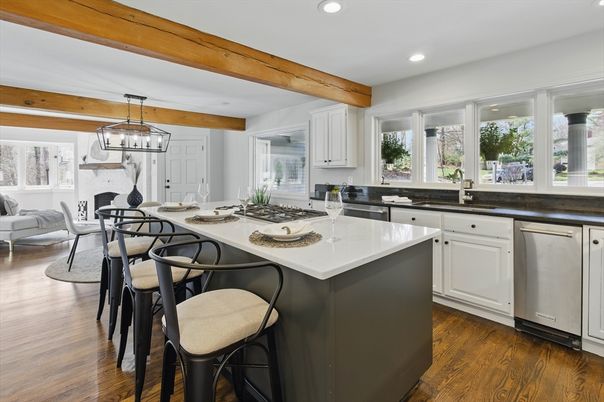Dining room, Interior, Kitchen, Living room, Pendant Lights, Recessed Lighting, Stainless Steel Appliances, Wooden Beams, Wood Texture Flooring