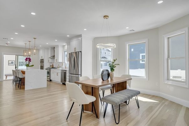 Dining room, Interior, Kitchen, Pendant Lights, Recessed Lighting, Stainless Steel Appliances, Wood Texture Flooring