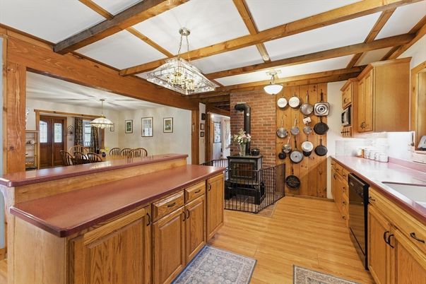 Dining room, Fireplace, Interior, Kitchen, Pendant Lights, Stone Walls, Wooden Beams, Wood Texture Flooring