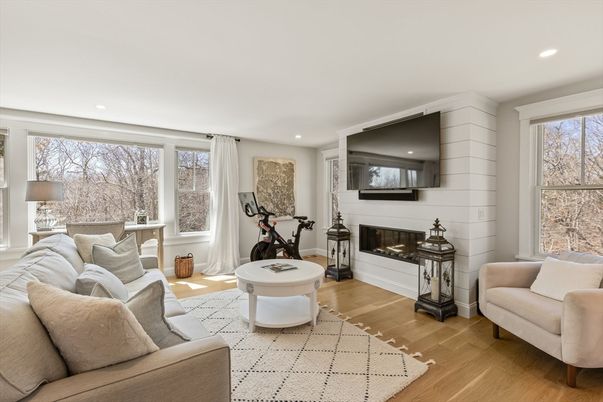 Fireplace, Fitness Equipment, Interior, Living room, Recessed Lighting, Wood Texture Flooring