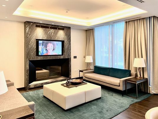 Fireplace, Interior, Living room, Marble Walls, Recessed Lighting, Wood Texture Flooring