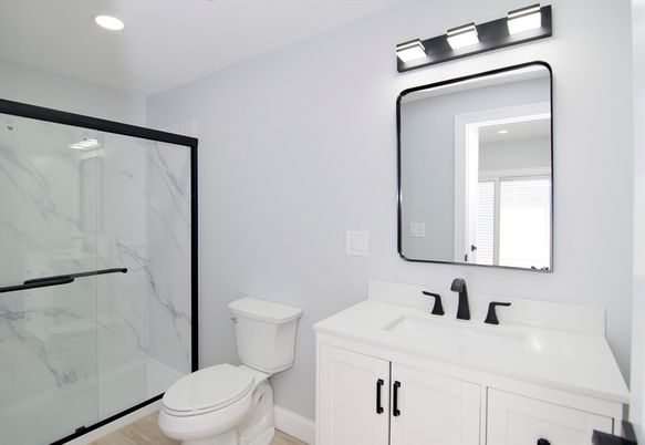 Bathroom, Glass Shower, Interior, Marble Walls, Recessed Lighting, Wood Texture Flooring