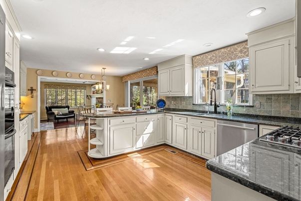 Chandelier, Dining room, Interior, Kitchen, Living room, Recessed Lighting, Stainless Steel Appliances, Wood Texture Flooring