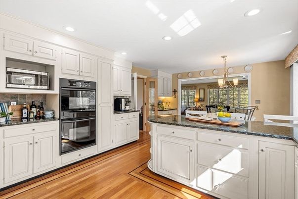 Chandelier, Interior, Kitchen, Pendant Lights, Recessed Lighting, Stainless Steel Appliances, Wood Texture Flooring