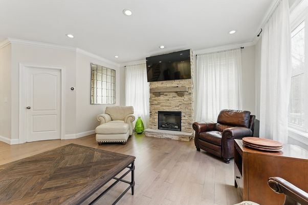 Fireplace, Interior, Recessed Lighting, Stone Walls, Wood Texture Flooring