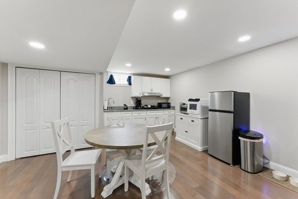 Dining room, Interior, Kitchen, Recessed Lighting, Stainless Steel Appliances, Wood Texture Flooring