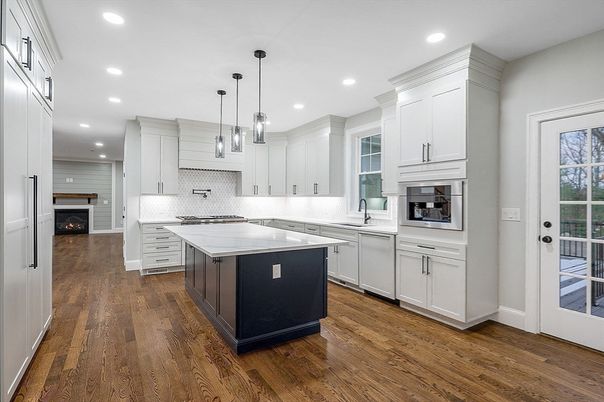 Fireplace, Interior, Kitchen, Pendant Lights, Recessed Lighting, Stainless Steel Appliances, Wood Texture Flooring