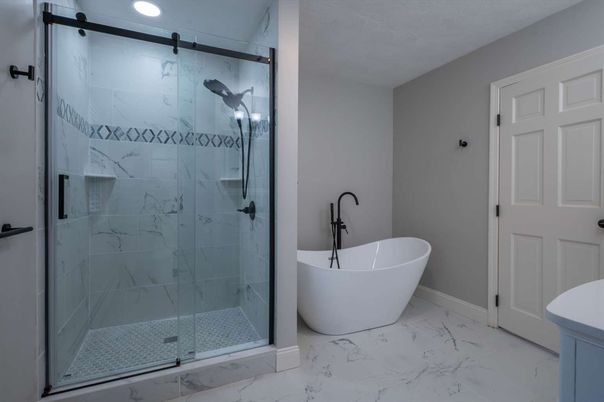 Bathroom, Free Standing Baths, Glass Shower, Interior, Marble, Marble Walls, Recessed Lighting
