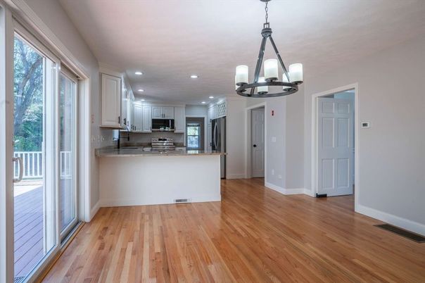 Chandelier, Interior, Kitchen, Pendant Lights, Recessed Lighting, Stainless Steel Appliances, Wood Texture Flooring