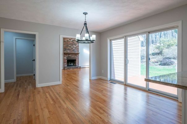 Empty room, Fireplace, Interior, Pendant Lights, Stone Walls, Wood Texture Flooring
