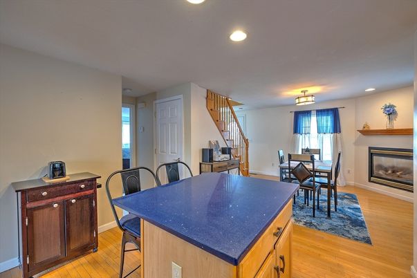 Dining room, Fireplace, Interior, Recessed Lighting, Wood Texture Flooring