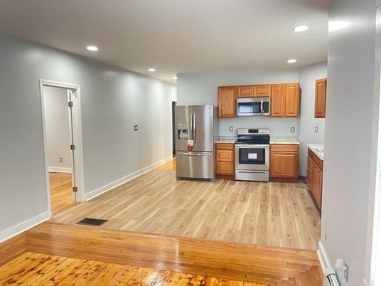 Interior, Kitchen, Recessed Lighting, Stainless Steel Appliances, Wood Texture Flooring