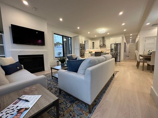 Dining room, Fireplace, Interior, Kitchen, Living room, Recessed Lighting, Stainless Steel Appliances, Wood Texture Flooring