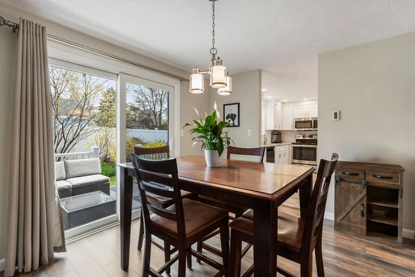 Dining room, Interior, Kitchen, Pendant Lights, Recessed Lighting, Stainless Steel Appliances, Wood Texture Flooring