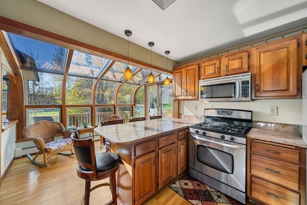 Glass Ceilings, Interior, Kitchen, Pendant Lights, Stainless Steel Appliances, Sun Room, Wood Texture Flooring