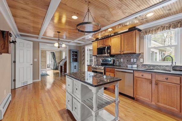 Chandelier, Interior, Kitchen, Pendant Lights, Recessed Lighting, Stainless Steel Appliances, Wooden Ceilings, Wood Texture Flooring