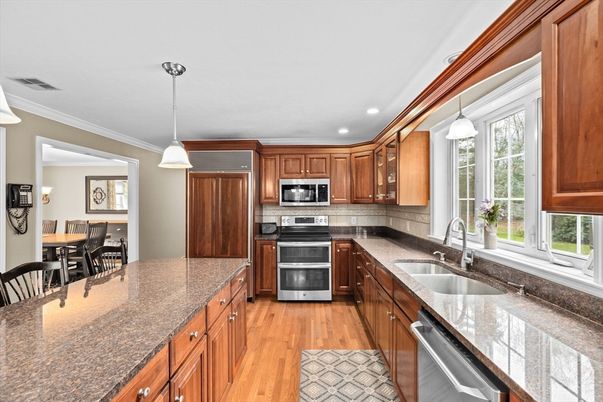Dining room, Interior, Kitchen, Pendant Lights, Recessed Lighting, Stainless Steel Appliances, Wood Texture Flooring