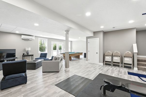 Billiard Table, Fitness Equipment, Game Room, Interior, Living room, Recessed Lighting, Wood Texture Flooring