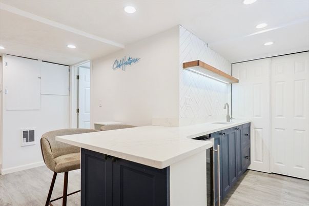 Interior, Kitchen, Marble Walls, Recessed Lighting, Wood Texture Flooring
