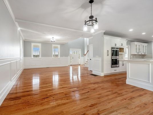 Empty room, Interior, Kitchen, Pendant Lights, Recessed Lighting, Stainless Steel Appliances, Wood Texture Flooring