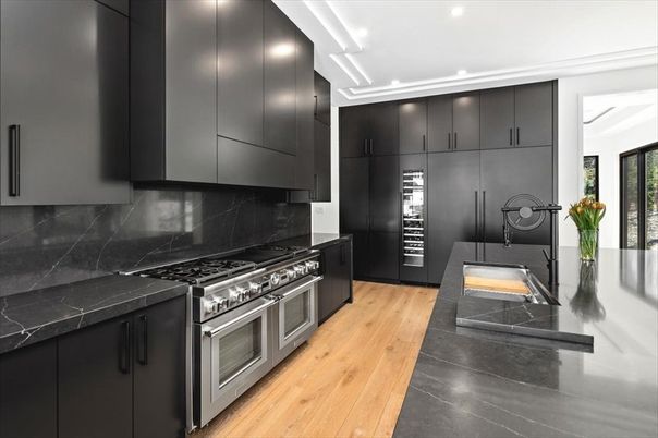 Interior, Kitchen, Marble Walls, Recessed Lighting, Stainless Steel Appliances, Wood Texture Flooring