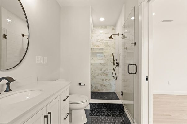 Bathroom, Glass Shower, Interior, Marble Walls, Recessed Lighting, Wood Texture Flooring