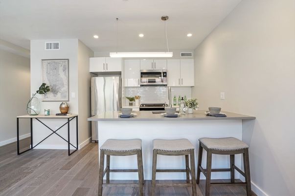 Interior, Kitchen, Pendant Lights, Recessed Lighting, Stainless Steel Appliances, Wood Texture Flooring