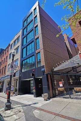 Exterior, Facade, Brick Facade, Condo Building