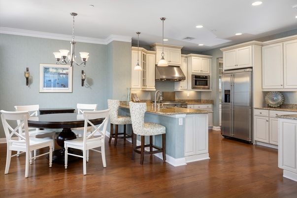 Chandelier, Dining room, Interior, Kitchen, Pendant Lights, Recessed Lighting, Stainless Steel Appliances, Wood Texture Flooring