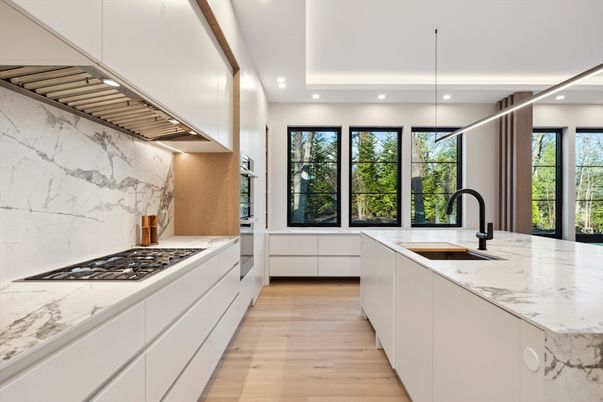 Interior, Kitchen, Marble Walls, Recessed Lighting, Stainless Steel Appliances, Wood Texture Flooring