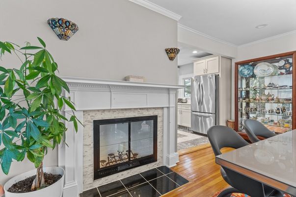 Fireplace, Interior, Kitchen, Recessed Lighting, Stainless Steel Appliances, Wood Texture Flooring