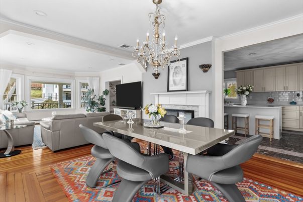 Chandelier, Dining room, Fireplace, Interior, Living room, Recessed Lighting, Wood Texture Flooring