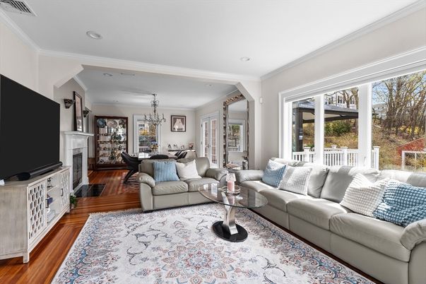 Chandelier, Dining room, Fireplace, Interior, Living room, Recessed Lighting, Wood Texture Flooring