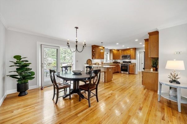 Chandelier, Dining room, Interior, Kitchen, Pendant Lights, Recessed Lighting, Stainless Steel Appliances, Wood Texture Flooring