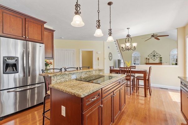 Chandelier, Dining room, Interior, Kitchen, Pendant Lights, Stainless Steel Appliances, Wood Texture Flooring
