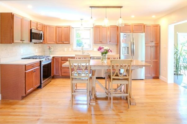 Dining room, Interior, Kitchen, Pendant Lights, Recessed Lighting, Stainless Steel Appliances, Wood Texture Flooring