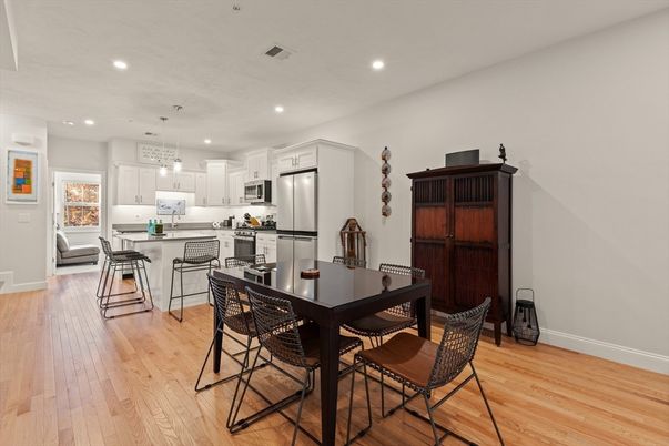 Dining room, Interior, Kitchen, Pendant Lights, Recessed Lighting, Stainless Steel Appliances, Wood Texture Flooring