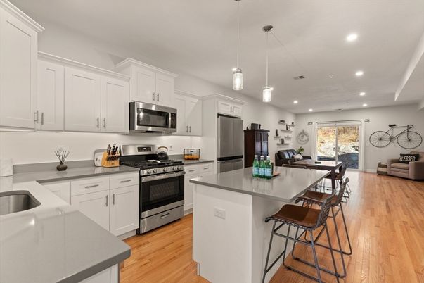 Interior, Kitchen, Pendant Lights, Recessed Lighting, Stainless Steel Appliances, Wood Texture Flooring