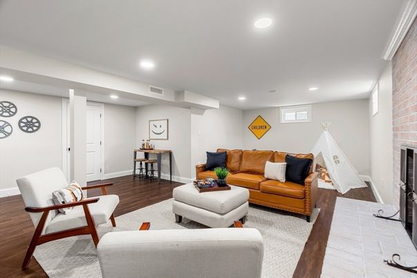 Fireplace, Interior, Living room, Recessed Lighting, Stone Walls, Wood Texture Flooring