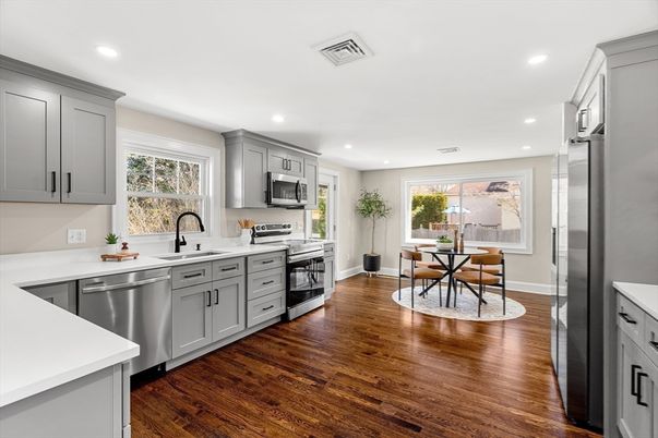 Dining room, Interior, Kitchen, Recessed Lighting, Stainless Steel Appliances, Wood Texture Flooring