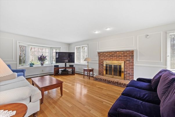 Fireplace, Interior, Living room, Recessed Lighting, Stone Walls, Wood Texture Flooring