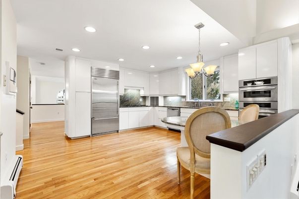 Chandelier, Interior, Kitchen, Pendant Lights, Recessed Lighting, Stainless Steel Appliances, Wood Texture Flooring